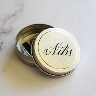 This little tin is perfect for keeping your calligraphy nibs safe!